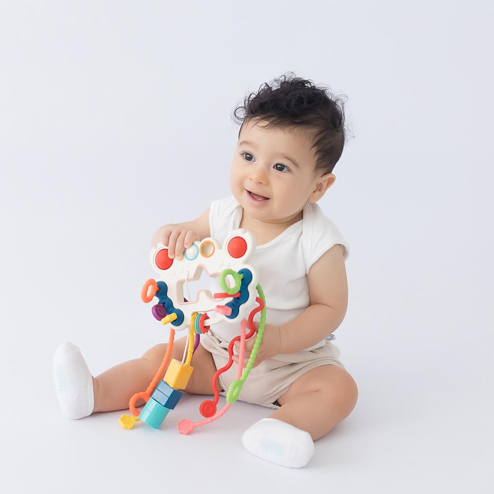 Brinquedo Sensorial Bebê Puxador Cordão Chocalho Pimpolho